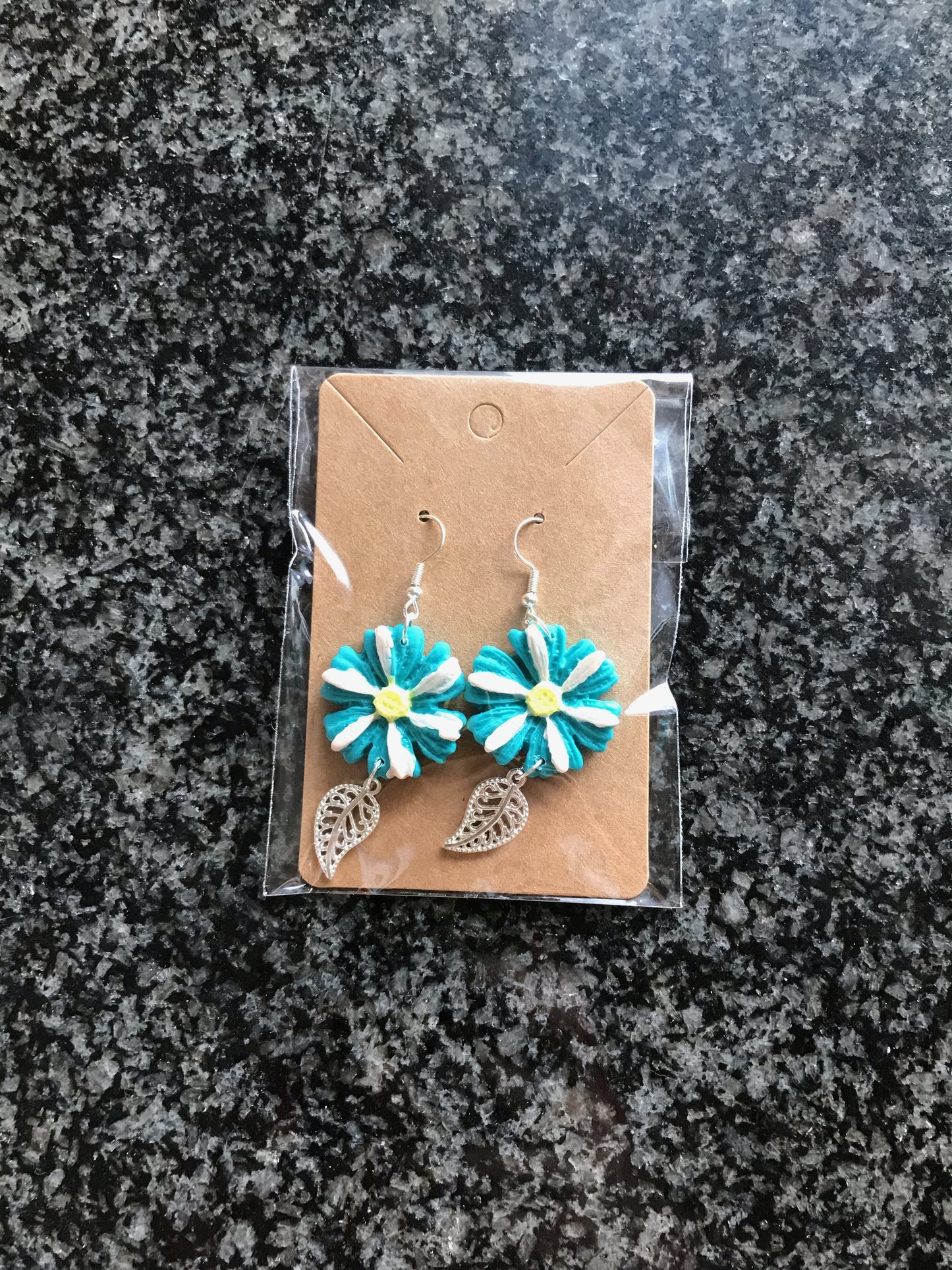 Turquoise flower with cute leaf